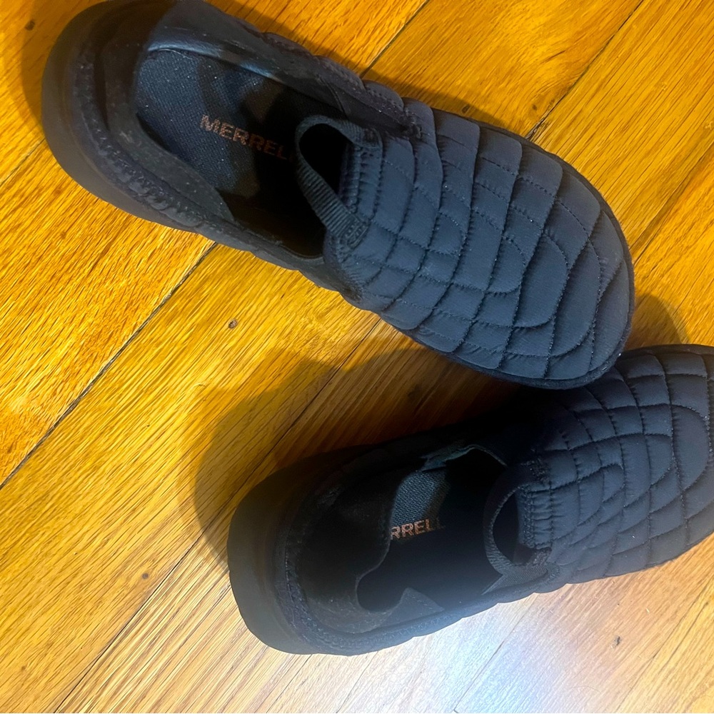 Black Merrell slip-ons.